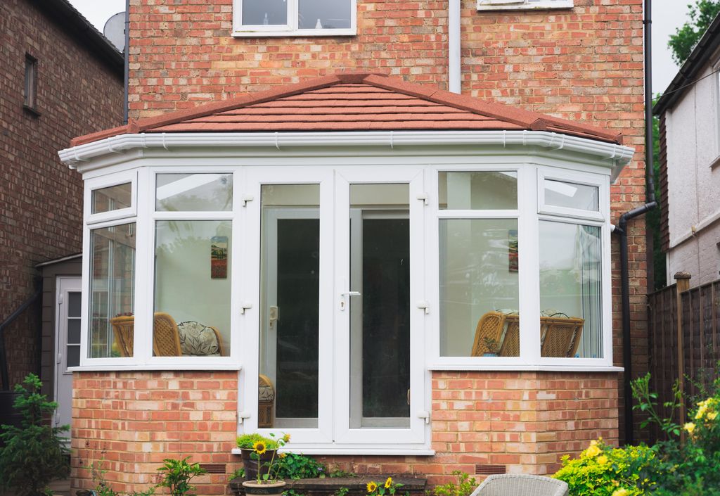 warm conservatory roof costs